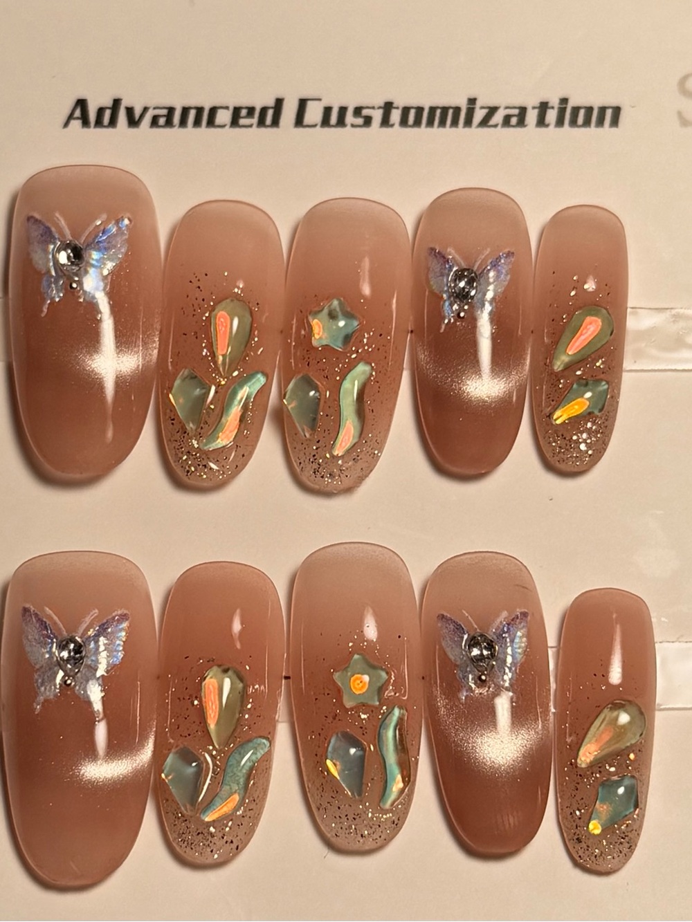 Neutral Pink Press-On Nail Set with Butterfly & Floral Accents